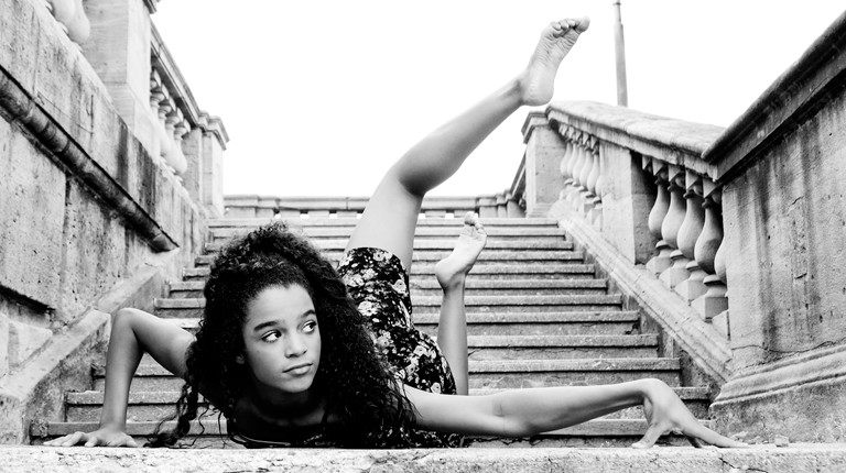 dayton dance conservatory dancer posing on stairs of dayton art institute downtown ohio
