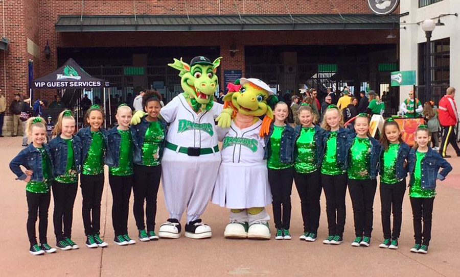 dayton dance conservatory mini dugout dancers posing at Fifth Third Field
