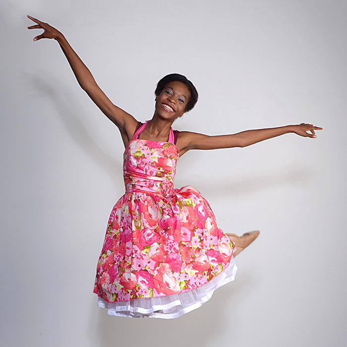 dayton dance conservatory dancer in colorful dress jumping